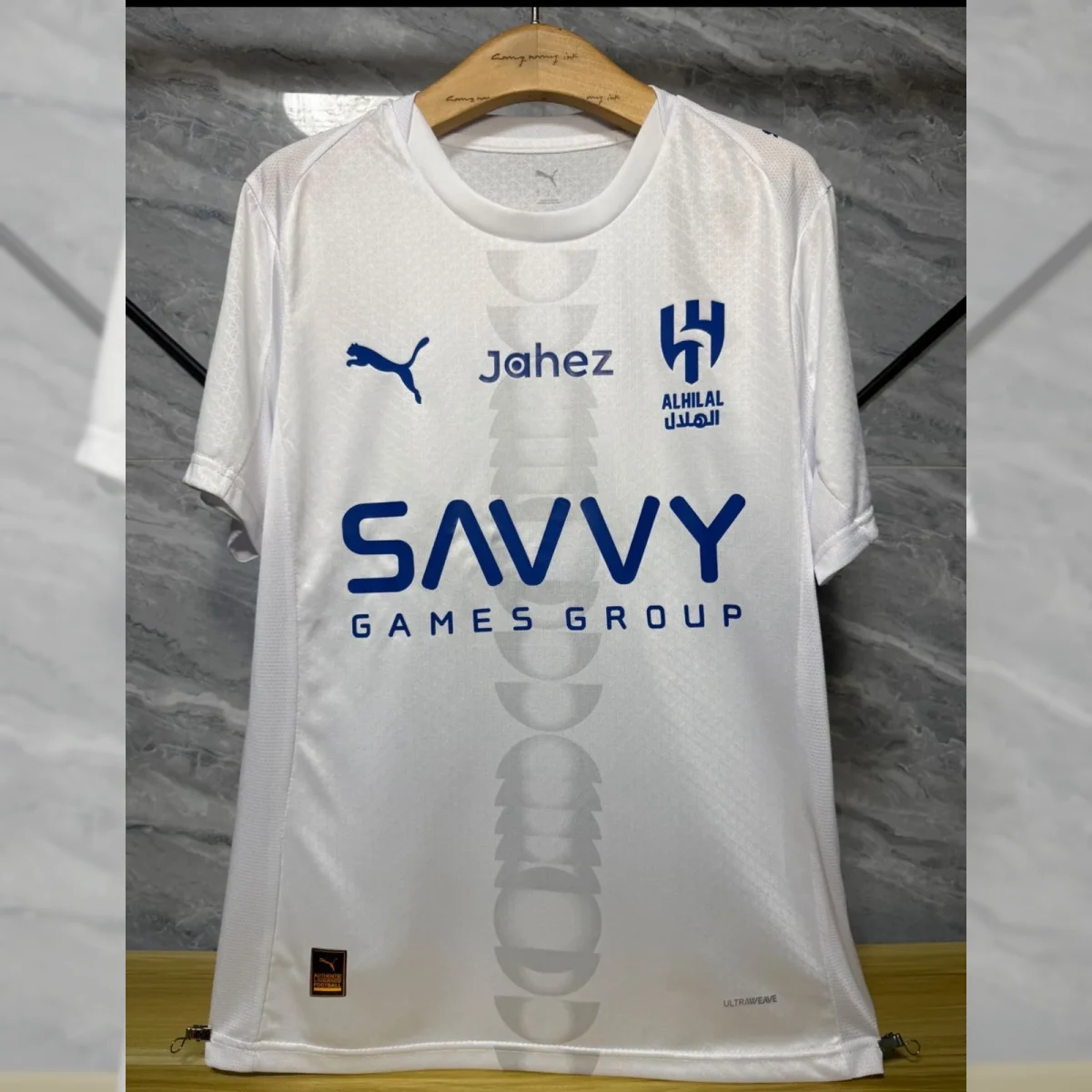 صورة تيشيرت الهلال 2026 الاحتياطي ابيض أنيق