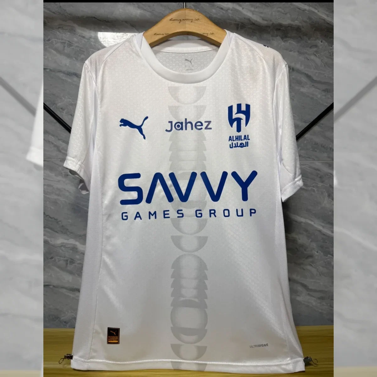 صورة تيشيرت الهلال 2026 الاحتياطي ابيض أنيق